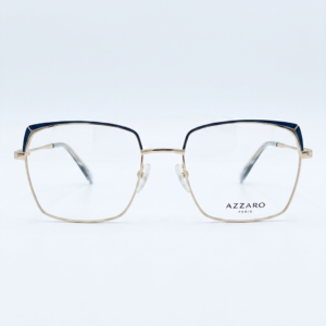 Pair of gold metal eyeglasses with a dark blue top edge on a white background, showcasing the frame design.